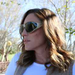 Morgan is wearing a large mica Vistana fitover with polarized lenses that retain true color definition.